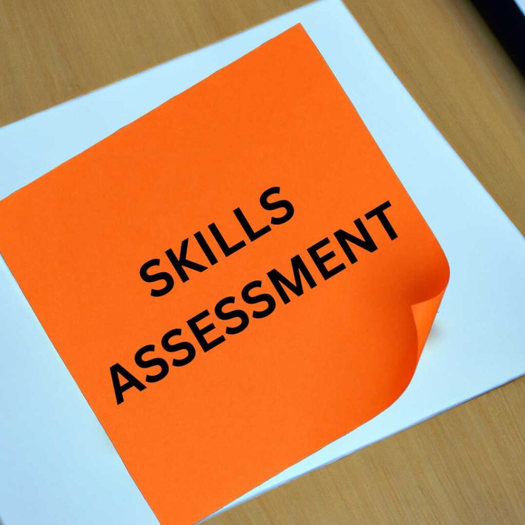 post it note on table with the words "Skills Assessment"